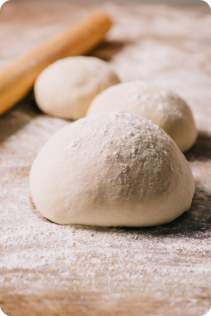selective-focus-of-raw-dough-for-pizza-and-rolling-2024-11-19-08-19-06-utc 1